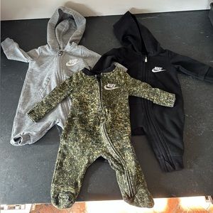 Got a few wears in and baby outgrew! Great condition Nike onesies! Size newborn